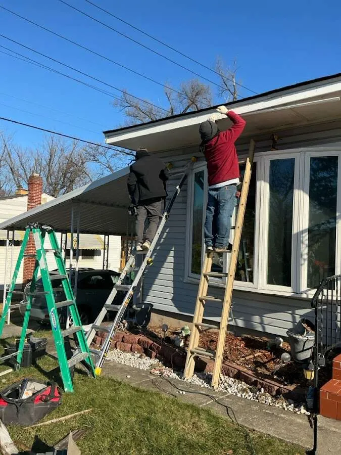Restoration crew performing exterior repair in Hopewell